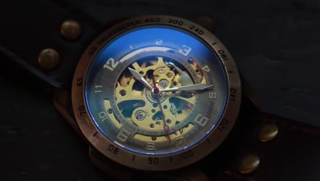 close up time lapse of a steampunk wrist watch