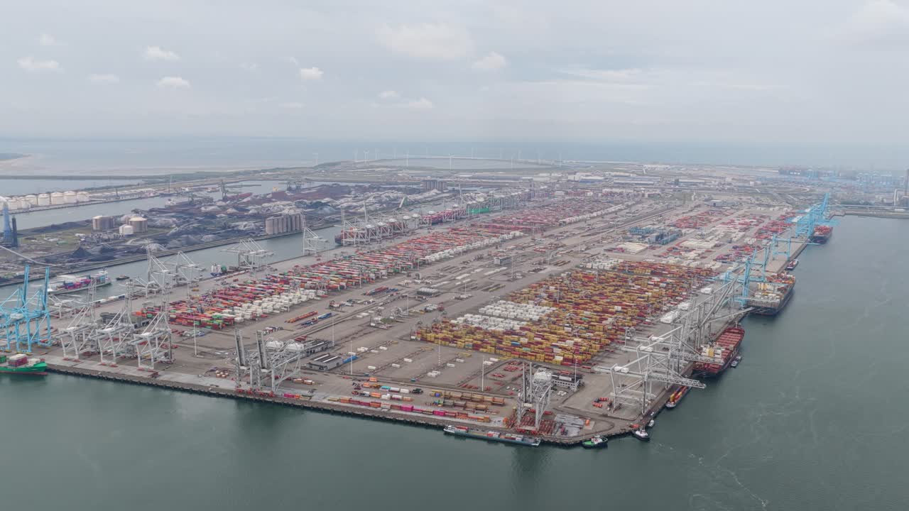 Global trade vessels at Netherlands container harbor, transporting cargo