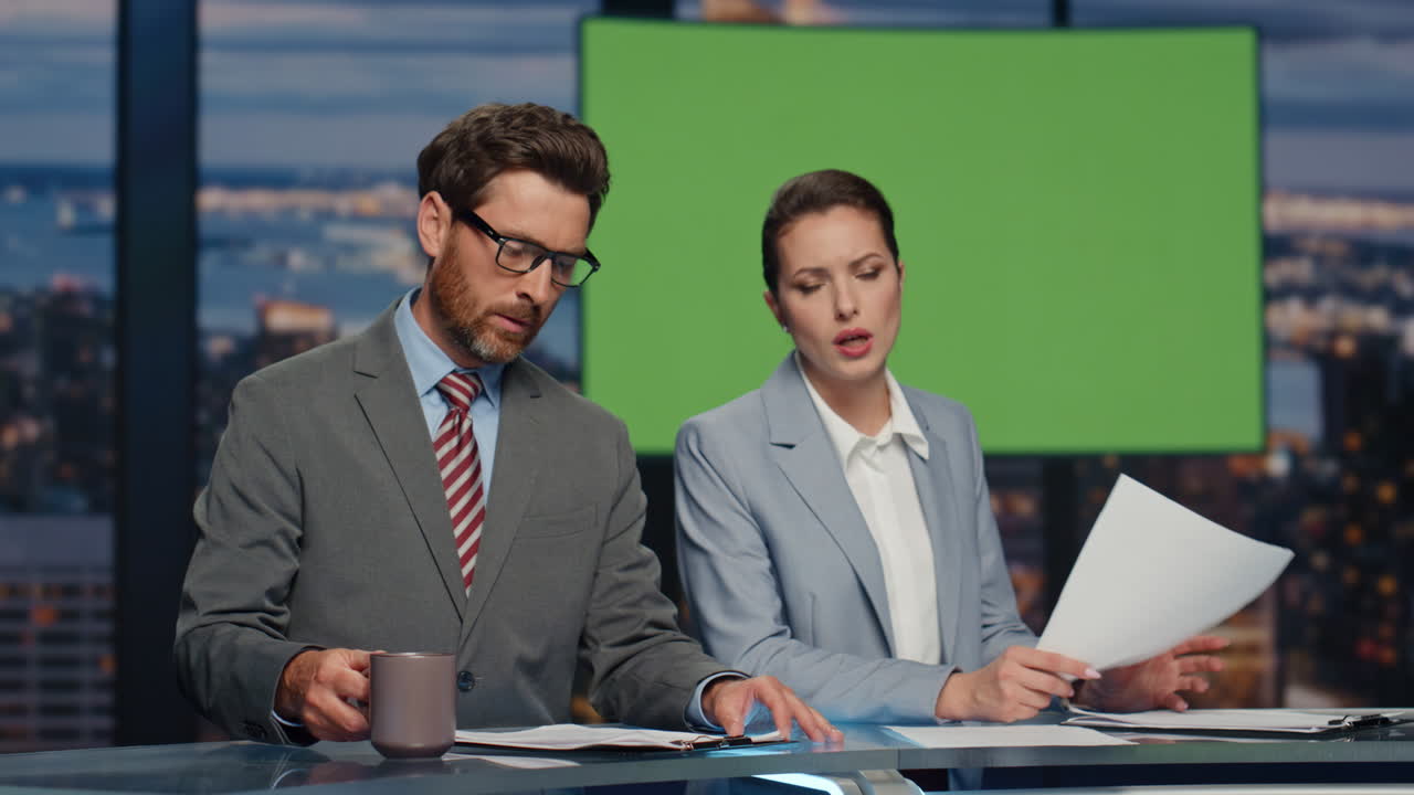 Presenters greenscreen tv studio lighting daily news at evening channel closeup