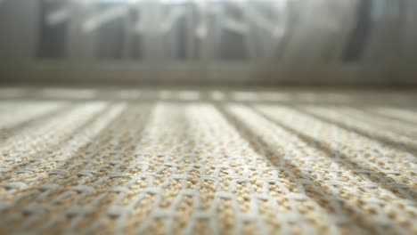 sunlight on woven carpet