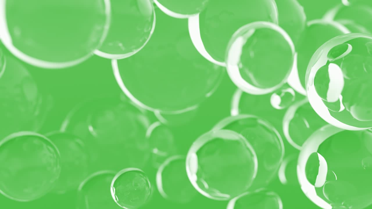 Bubble oil on water background green color. Flying abstract glass or water blobs or drops. 3d animation of 4k UHD. Soap Bubbles Isolated