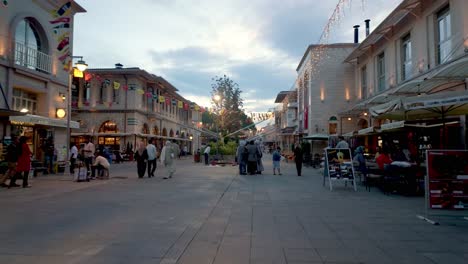 experience the lively scenes of konya’s central market, with locals and visitors mingling at twilight.