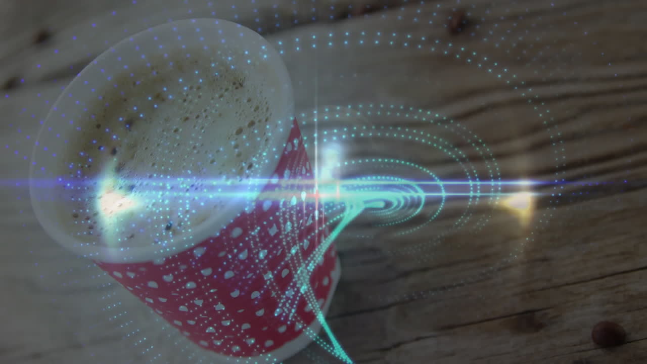 Red polka dot cup topped by coffee foam getting scanned on table, showing digital circles overlay