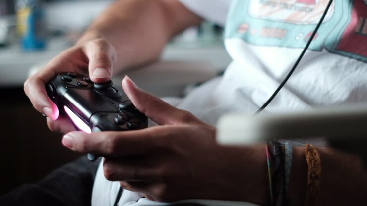 Gamer Engaged in Intense Play on Console Controller