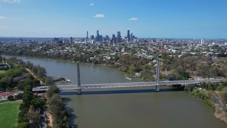 eleanor schonell bridge spanning brisbane river, backdropped by brisbane skyline