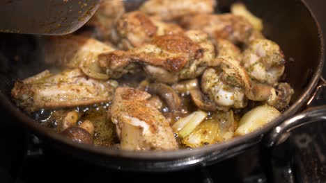 cooking-some-chicken-wings-and-mushrooms