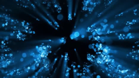 bright blue particles move gracefully against a dark backdrop, forming a dynamic, mesmerizing pattern of light. this captivating display evokes a sense of energy and wonder.