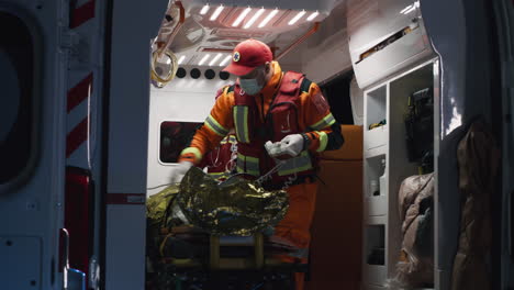paramedics providing emergency care in an ambulance