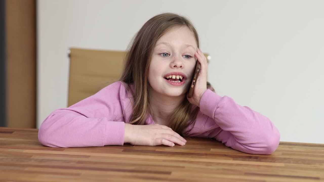 Young girl talking on a smartphone