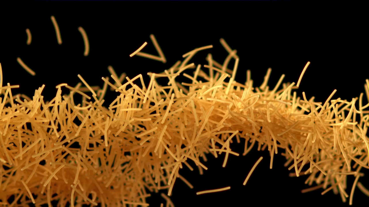 Pasta vermicelli secca che cade e galleggia su sfondo nero