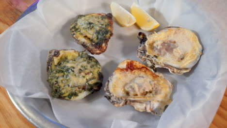 two versions of grilled oysters, birdseye view of grilled oyster appetizer, hd