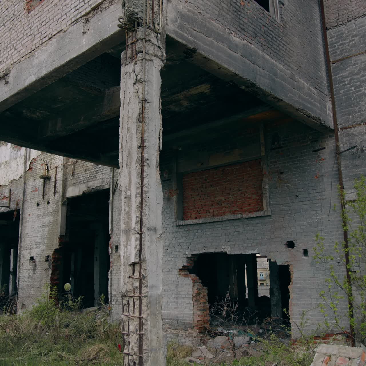 Empty ruined place. Abandoned territory with destroyed buildings with no people after the emissions of chemical attack. Post-apocalyptic zone