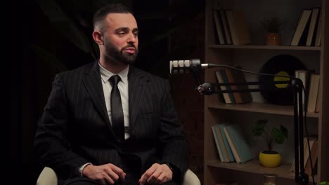 businessman giving a podcast interview