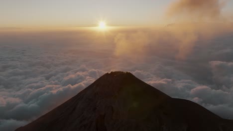 Summit-of-active-Fuego-Volcano-in-Guatemala-during-sunset---Aerial