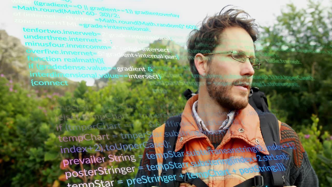 man wearing glasses and backpack exploring mountain trail, showcasing floating code snippets tech