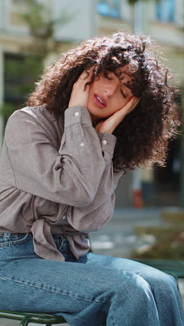 displeased exhausted woman rubbing temples to cure headache problem suffering from tension migraine