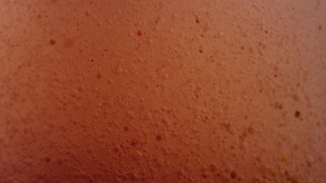 Macro close-up of the surface of the sun liquid texture background