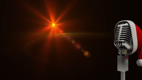 animación de luz y micrófono vintage en sombrero de santa sobre fondo rojo