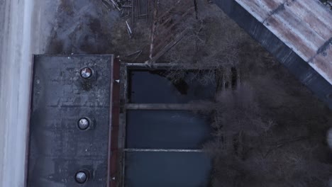 Old-abandoned-factory-pools,-full-of-water