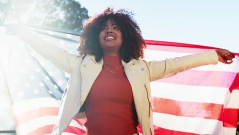 woman celebrating with american flag