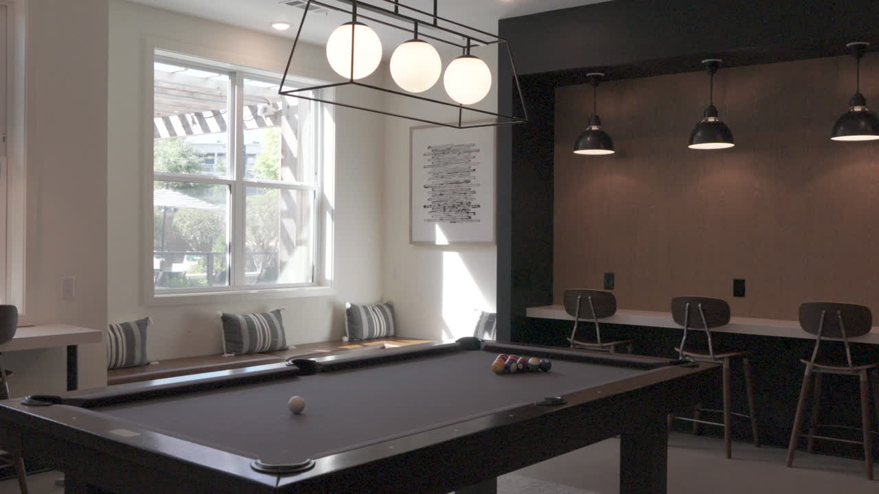 Stylish interior of a social lounge featuring a billiard table