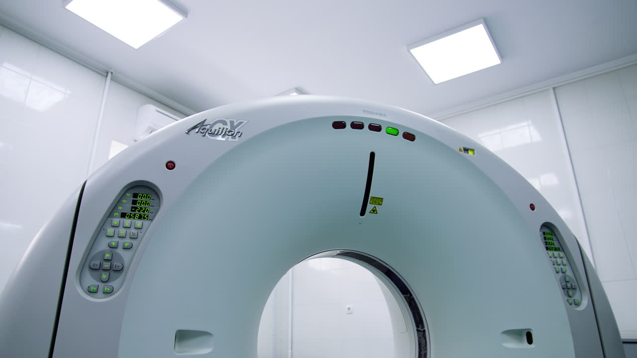 Distancing from advanced tomography equipment in a hospital. Modern laboratory for magnetic scanning. Low angle view.