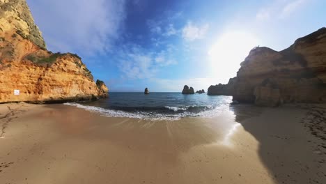 the beaches, cliffs, waves, and sea in the lagos region of portugal, particularly in the ponta da piedade area, are a sight to behold with their stunning beauty