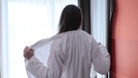 Bathroom scene with person getting out of bathtub