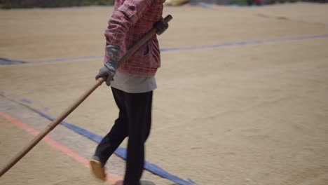 farmers drying rice