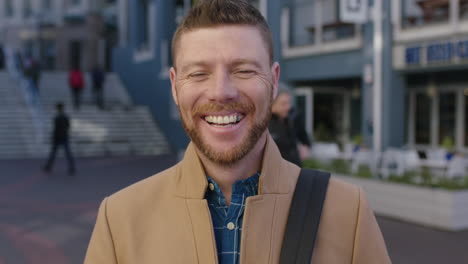 slow-motion-portrait-of-charming-caucasian-man-laughing-happy-in-urban-background