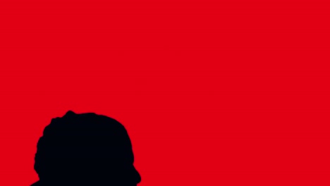 silhouette of a person yelling against a red background