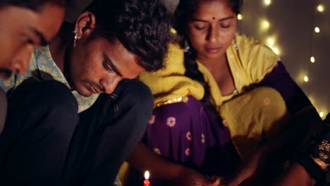 friends family decoarting for hindu festival of diwali