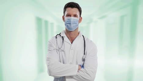 retrato de un médico caucásico con una máscara facial contra un fondo blanco
