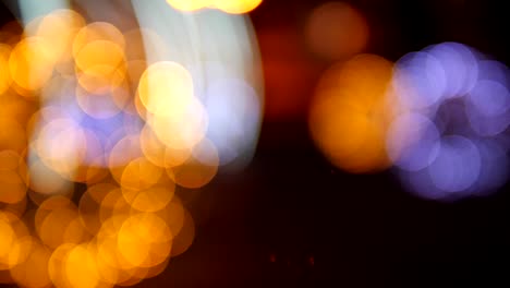 defocused bokeh lights. blurry christmas lights festive background.