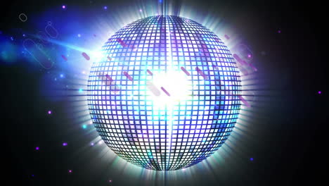 purple light trails over purple spinning disco ball against blue spots of light on black background