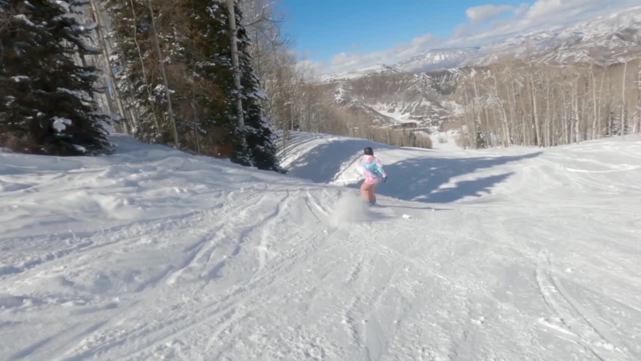 ollie perfecto de una snowboarder
