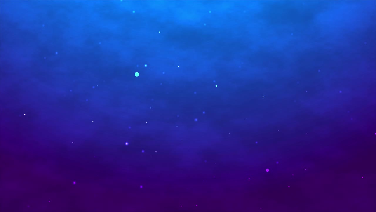 Glowing white particles gently float through a vibrant, abstract background of blue and dark purple colored smoke. An atmospheric and magical motion graphic