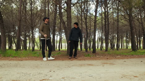 on father's day, a walk with your son in the natural park