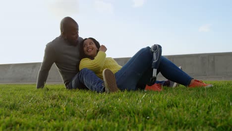 happy couple interacting with each other in the park 4k