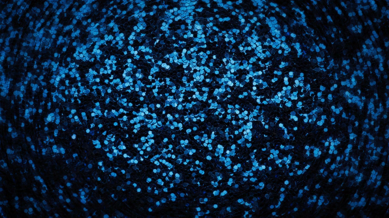 Glitter blu che sfuma nel nero. Sfondo astratto