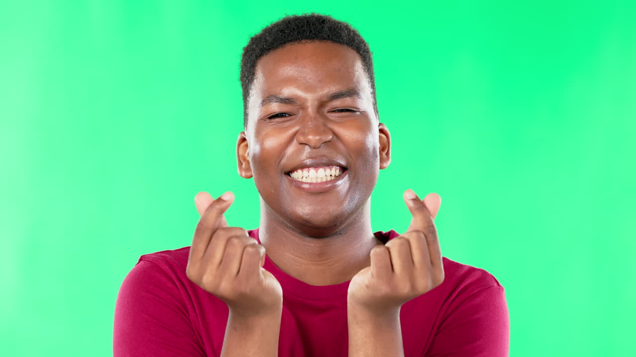 Finger hearts, smile and green screen with black