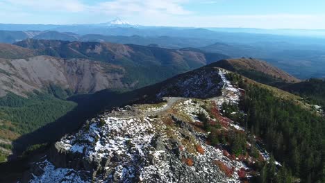 aerial video above a prominent mountain in the pacific northwest of the usa