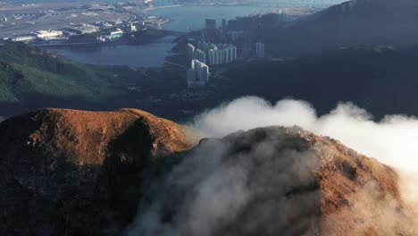 a time-lapse video of slow moving clouds moving along the ridge of the lantau peak (960m) in lantau island the largest island in hong kong.landscape of lantau island, hong kong, china