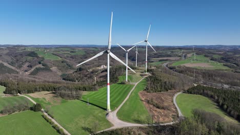 wind turbines, clean energy in green landscape, clean energy, electricity from the wind. aerial view.