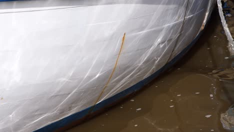 water reflections on a ships bow