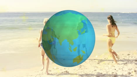 globe animation over people walking on sandy beach by ocean