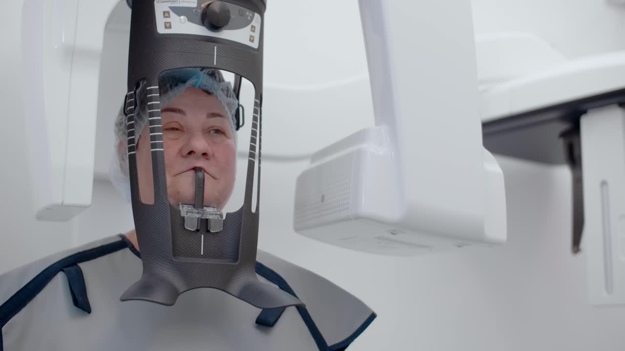 Patient undergoing a dental x-ray procedure