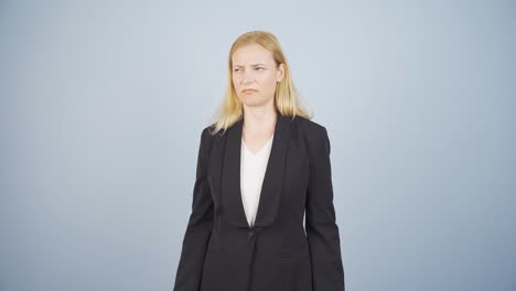 unsuccessful business woman. she looks at the camera negatively.