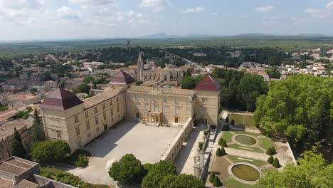 flying over a beautiful castle  with a park in south of france. castries city