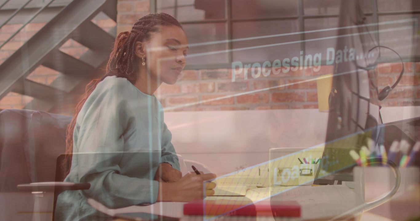 Young Professional Woman Working at Desk with Digital Data Overlay